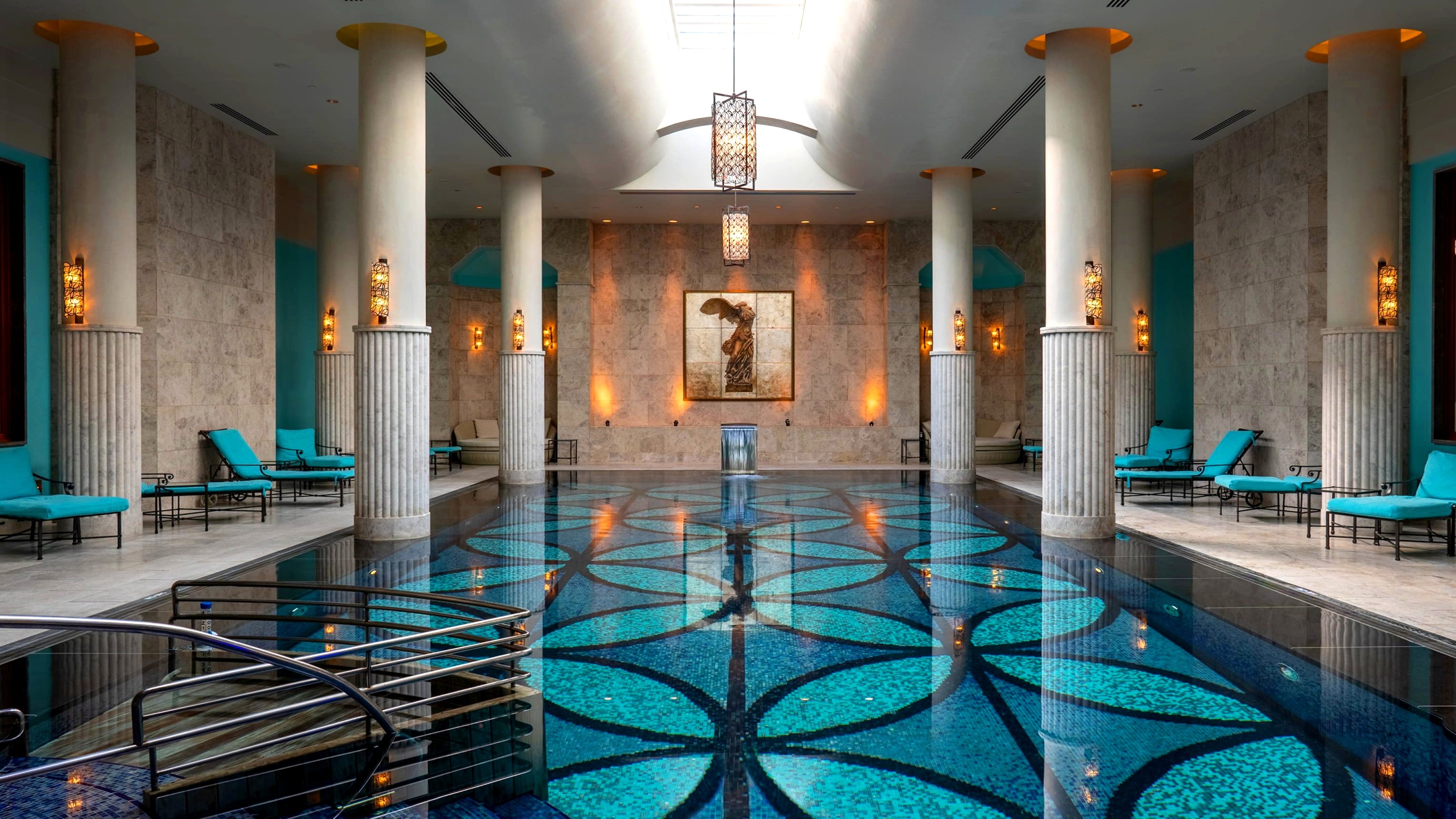 Four Seasons spa pool with mosaic floor and colonnade