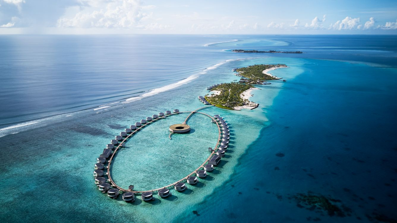The ring of overwater villas at The Ritz-Carlton Maldives, Fari Islands, seen from the air