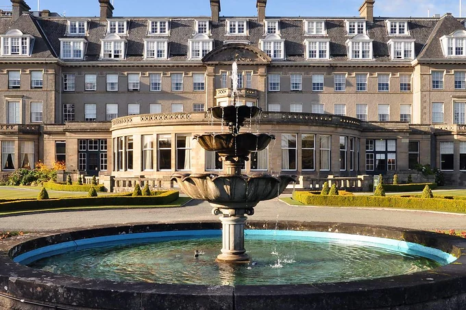 The Gleneagles Hotel in Perthshire seen across its formal gardens and fountain