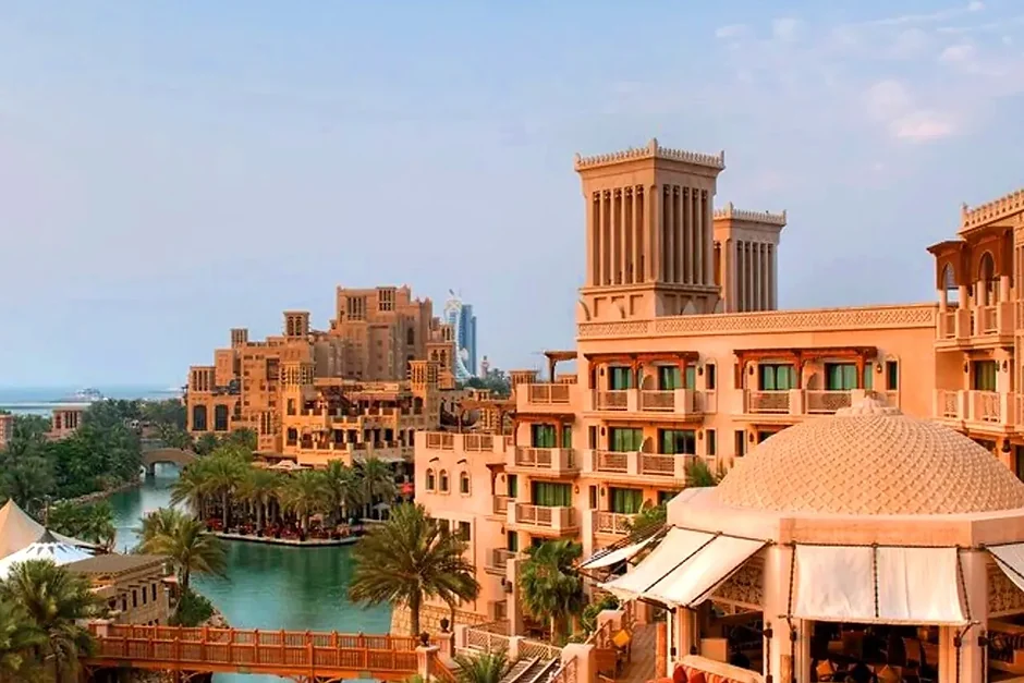 Madinat Jumeirah's waterways and wind towers with the Burj Al Arab beyond