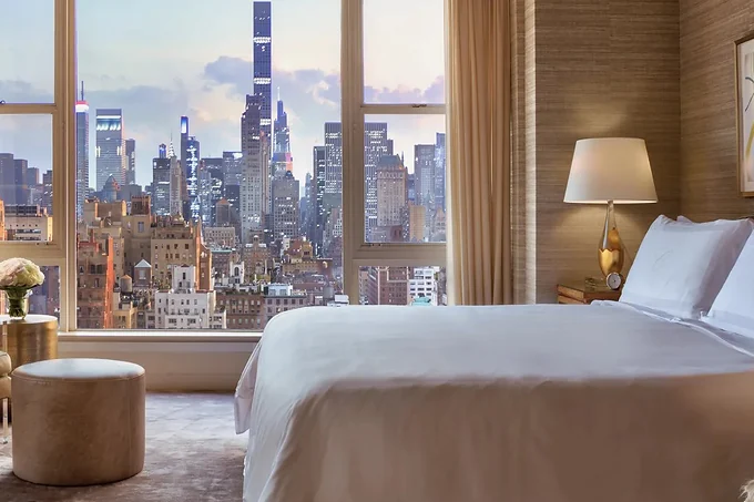 A guest room at The Carlyle looking south over the New York skyline