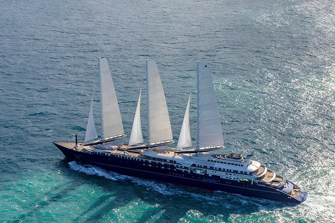 A five-masted sailing yacht under way on open water